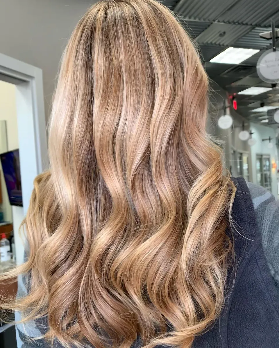 Long, wavy golden blonde balayage